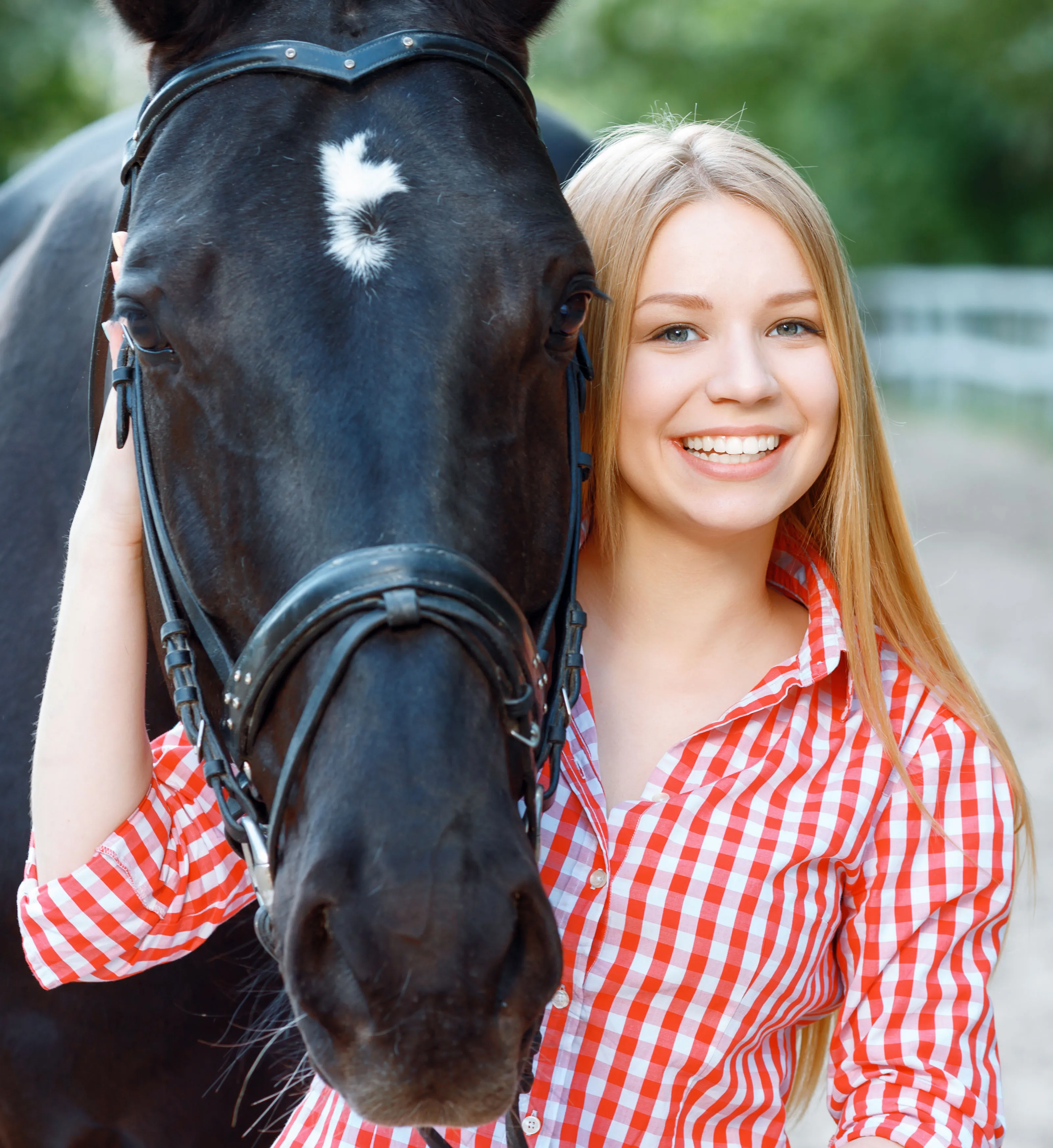 Woman beside her horse