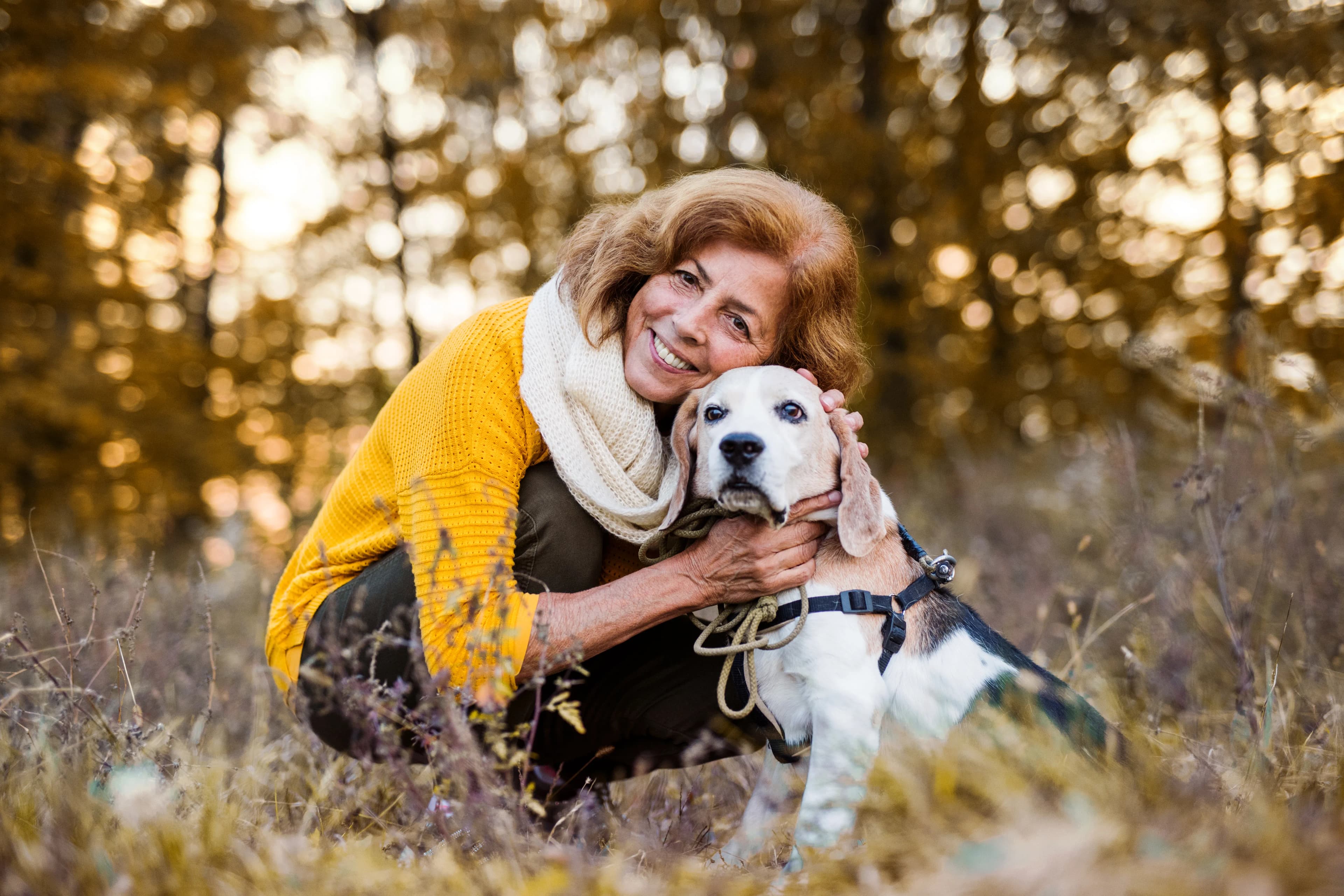 Woman sharing a quiet outdoor moment with her dog
